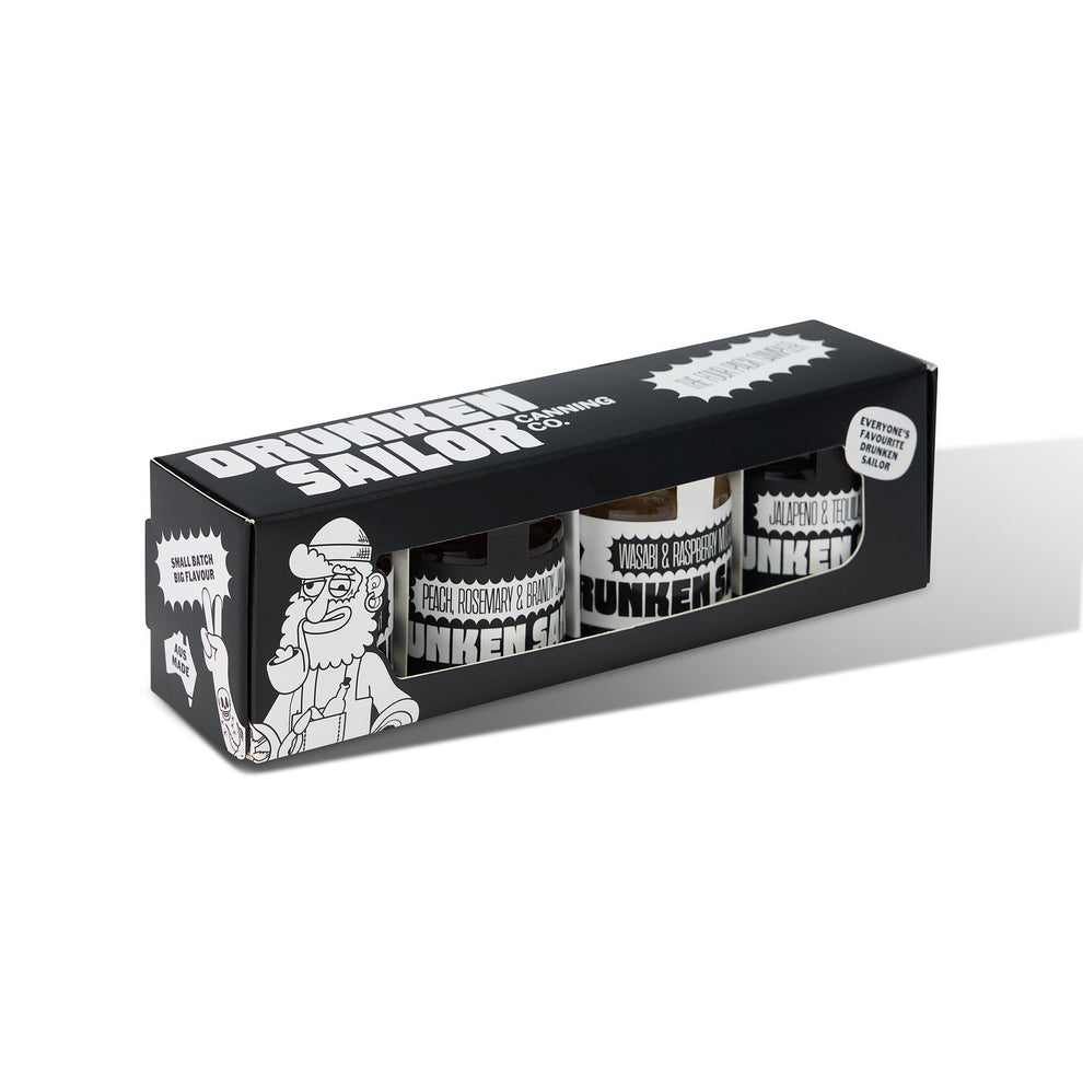 Drunken Sailor Gourmet Relish Mini Gift Pack 4-pack jars on a cheese board